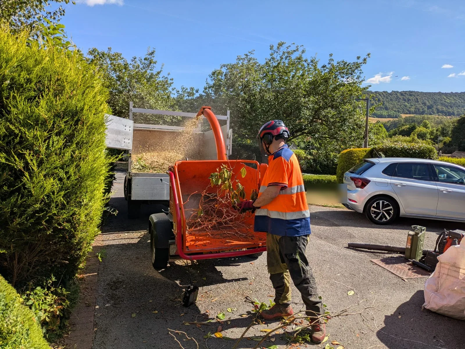 Chipping the arisings during the site clear-up